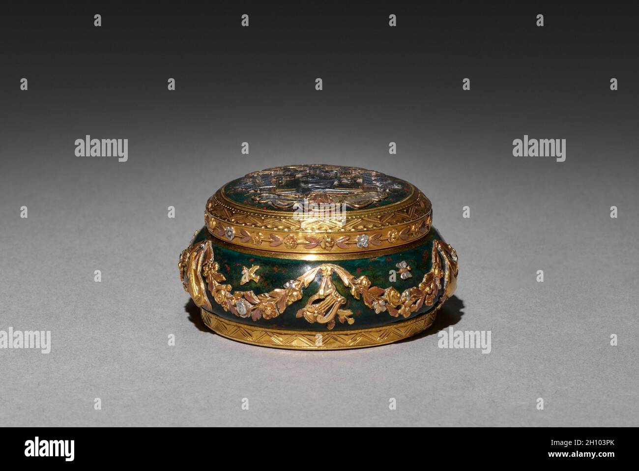 Bonbonniere, 1850-1899. France, 19th century. Bloodstone (?) mounted in colored golds; diameter: 5 cm (1 15/16 in.). Stock Photo