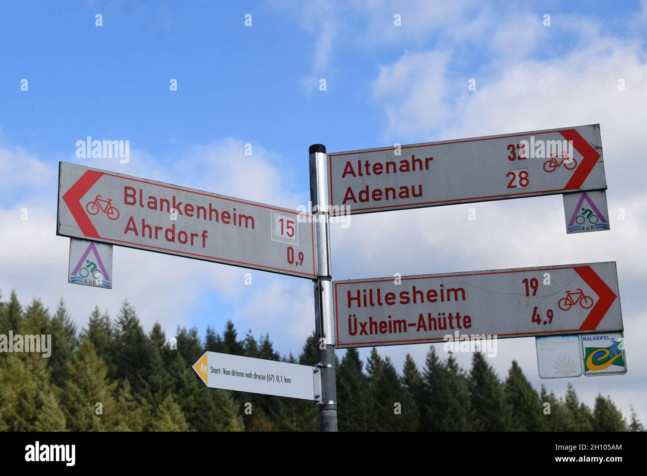 bike road sign to Altenahr, Adenau, Hillesheim, Üxheim, Ahütte, Blankenheim, Ahrdorf Stock Photo