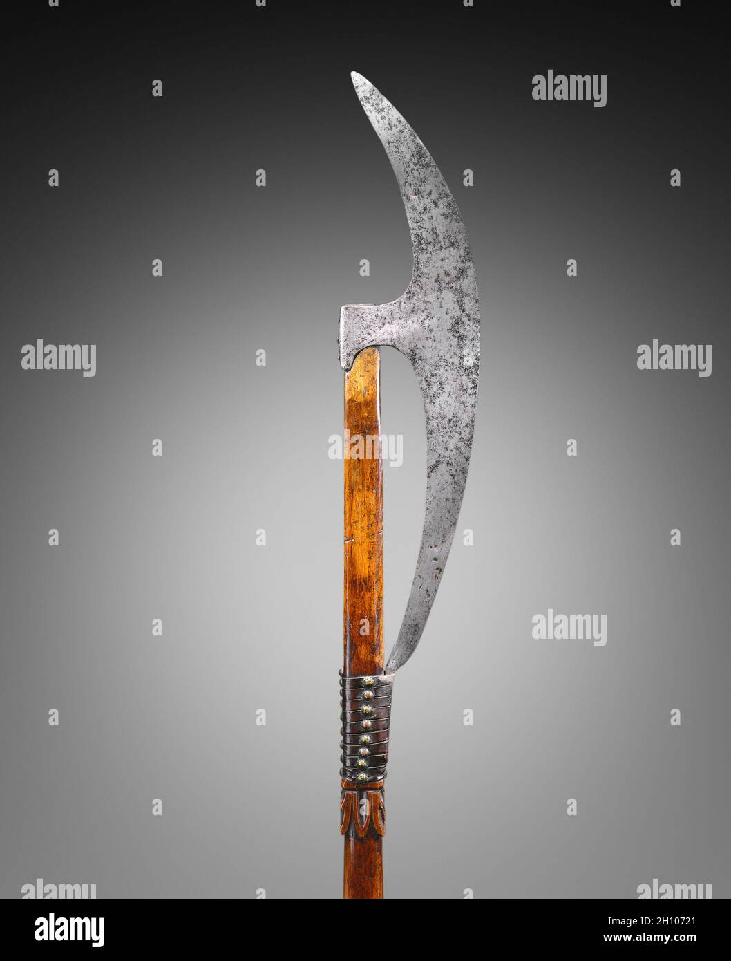 Bardiche (Pole Axe), 1500s. Germany or Russia, 16th century. Steel, leather, brass; wood haft; overall: 178.5 cm (70 1/4 in.); blade: 14.2 cm (5 9/16 in.). Stock Photo