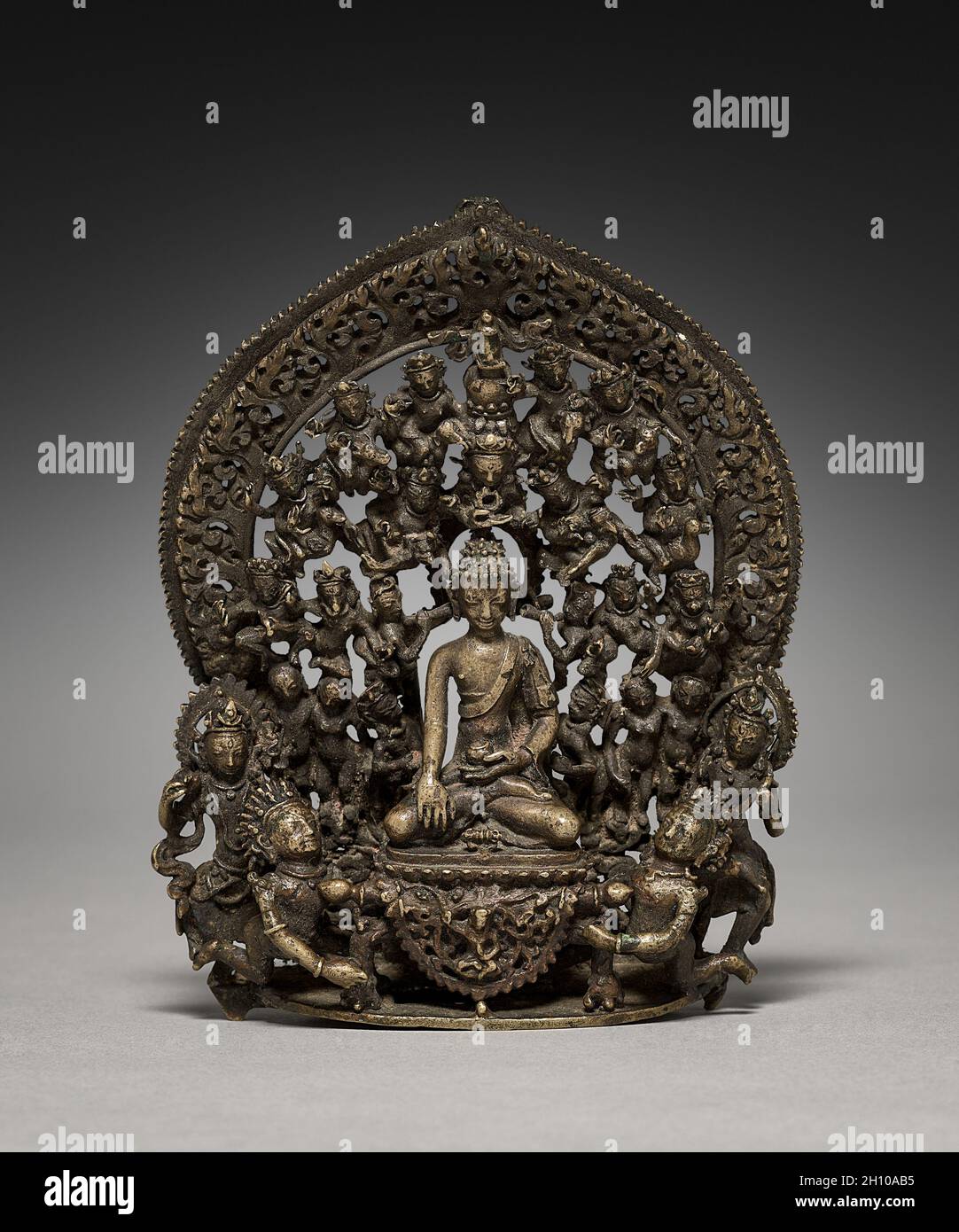 Triumph of the Buddha, Marvijaya, 15th century. Nepal, 15th century. Bronze; overall: 14 x 10.8 cm (5 1/2 x 4 1/4 in.). Stock Photo