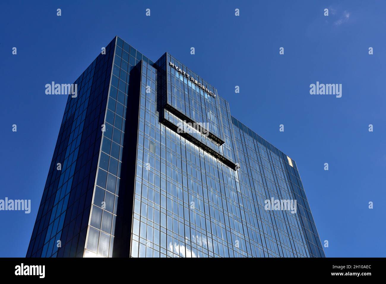 Hyatt Regency hotel building against blue sky Stock Photo
