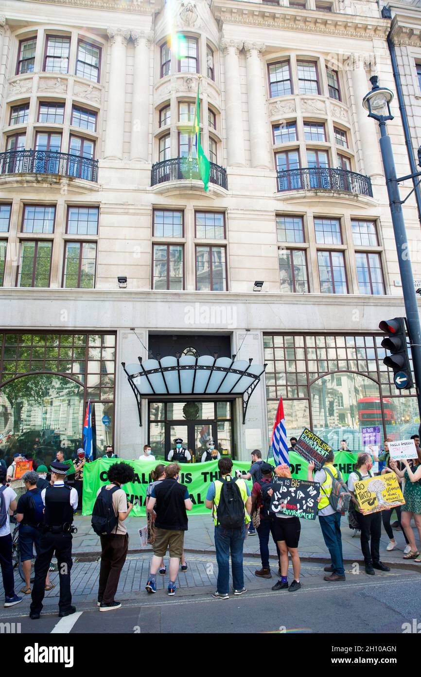 People stage a demonstration for protecting the environment outside the Embassy of Brazil in central London on World Environment Day. Stock Photo