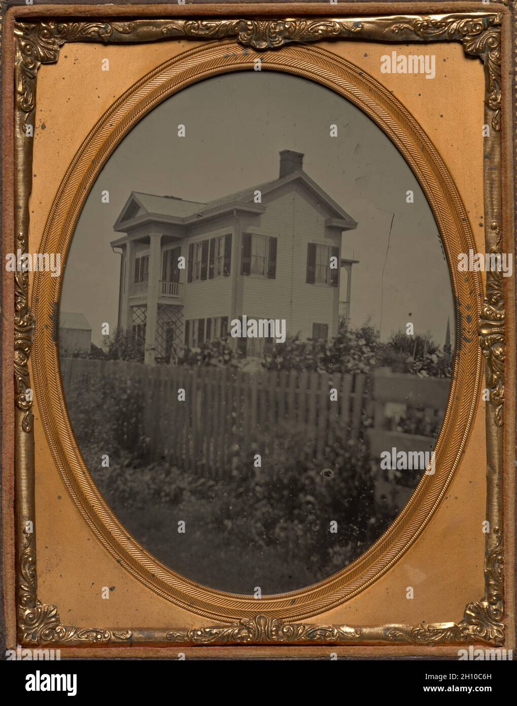 Homestead with picket fence and flowers, 1850–65. America. Ambrotype, half plate; overall: 14 x 10.8 cm (5 1/2 x 4 1/4 in.). Stock Photo