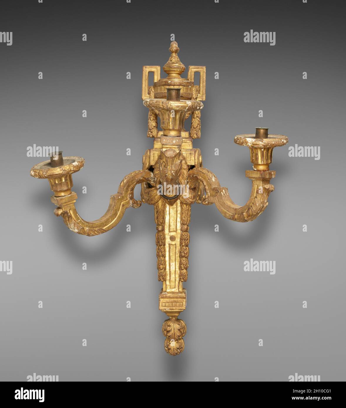 Candle Bracket, c. 1765-1775. After a design by Jean Charles Delafosse (French, 1734-1789). Carved and gilded wood; overall: 89.2 x 63.5 x 45.1 cm (35 1/8 x 25 x 17 3/4 in.). Stock Photo