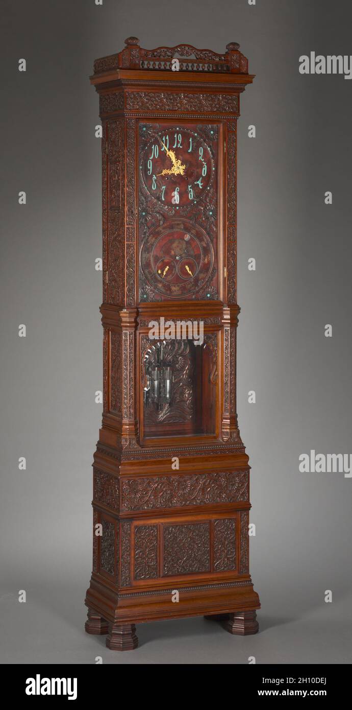 Tall Clock, c. 1880. Tiffany & Co. (American, New York, est. 1837). Mahogany, teak with dial faces of gilded and patinated metal, glass; overall: 247.3 x 66 x 36.5 cm (97 3/8 x 26 x 14 3/8 in.). Stock Photo