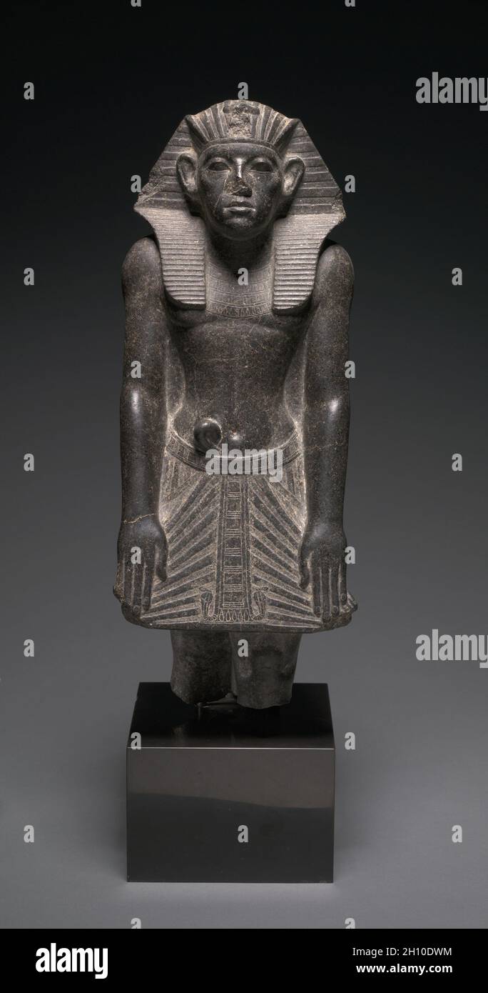 Statue of Amenemhat III, c. 1859–1814 BC. Egypt, Middle Kingdom, Dynasty 12 (1980-1801), reign of Amenemhat III. Granodiorite; overall: 51.2 x 19.8 x 18.4 cm (20 3/16 x 7 13/16 x 7 1/4 in.). Stock Photo