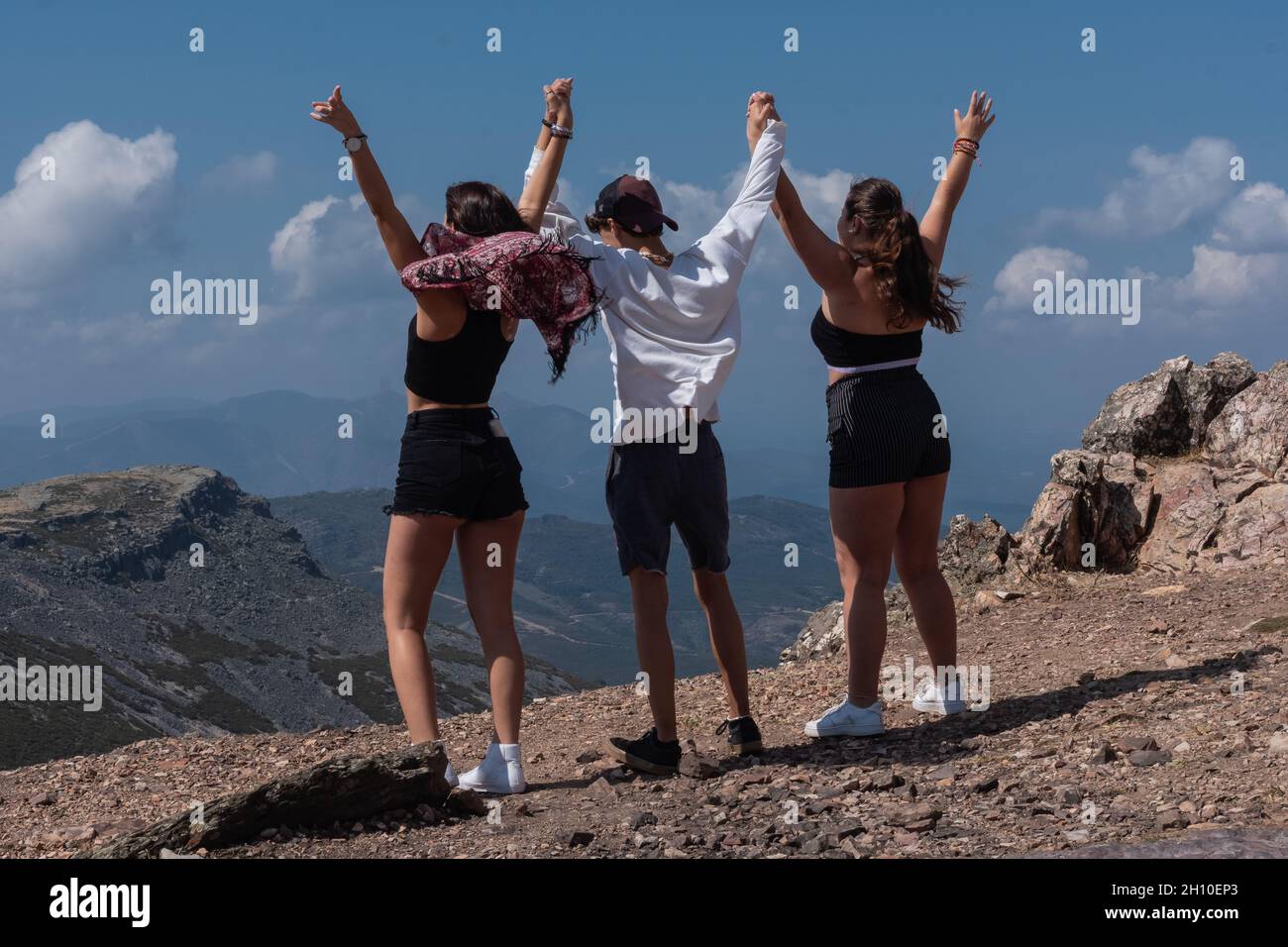 Woman top hill arms raised hi-res stock photography and images - Alamy