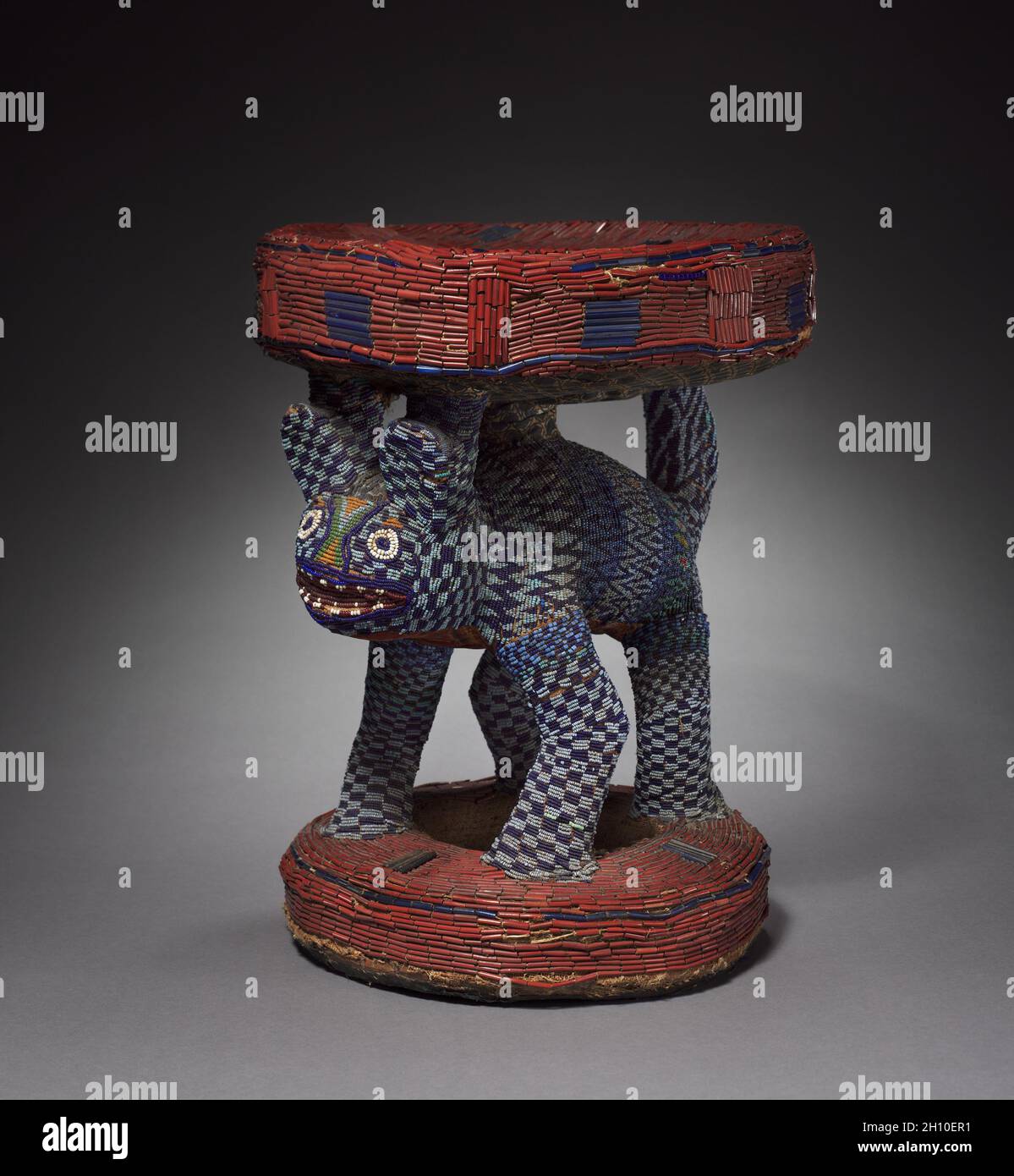 Prestige stool (Kuo), possibly 1800s. Africa, Central Africa, Cameroon, Bandjoun Kingdom, Bamileke makers. Wood, cotton, plant fiber, glass beads, and indigo; overall: 51 x 38 x 43 cm (20 1/16 x 14 15/16 x 16 15/16 in.). Stock Photo