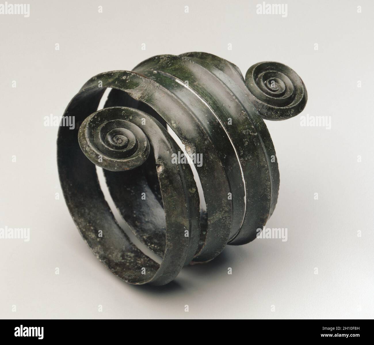Turned Armilla, c. 1500 BC. Hungary, Bronze Age, c. 2500-800 BC. Bronze, wrought; overall: 12.5 x 10.4 cm (4 15/16 x 4 1/8 in.). Stock Photo
