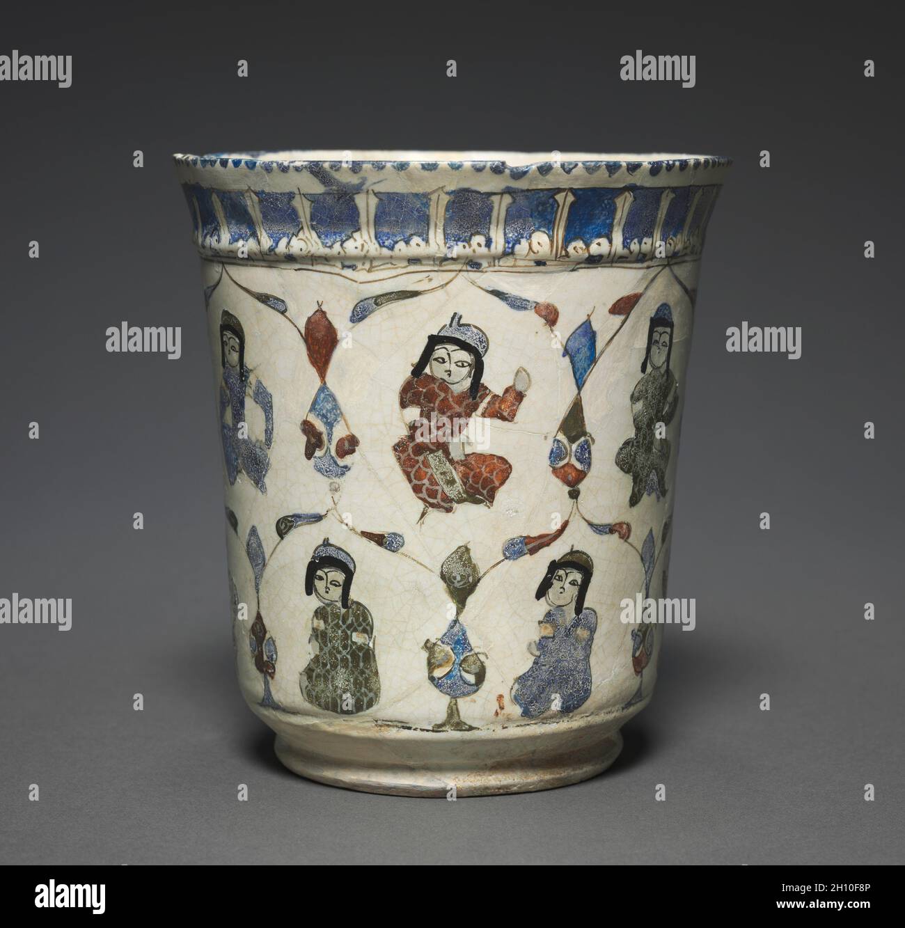 Mina'i Beaker with Seated Princes, 1180–1220. Iran, Kashan, Seljuq period of Iran (1037–1194). Fritware with overglaze design, mina’i ware; overall: 13.3 x 12.3 cm (5 1/4 x 4 13/16 in.). Stock Photo