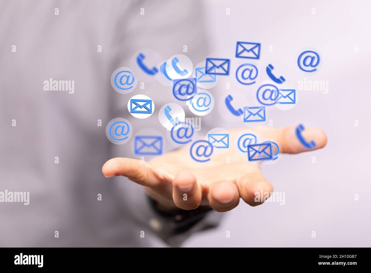 3D rendering of digital email icons floating over hand Stock Photo - Alamy