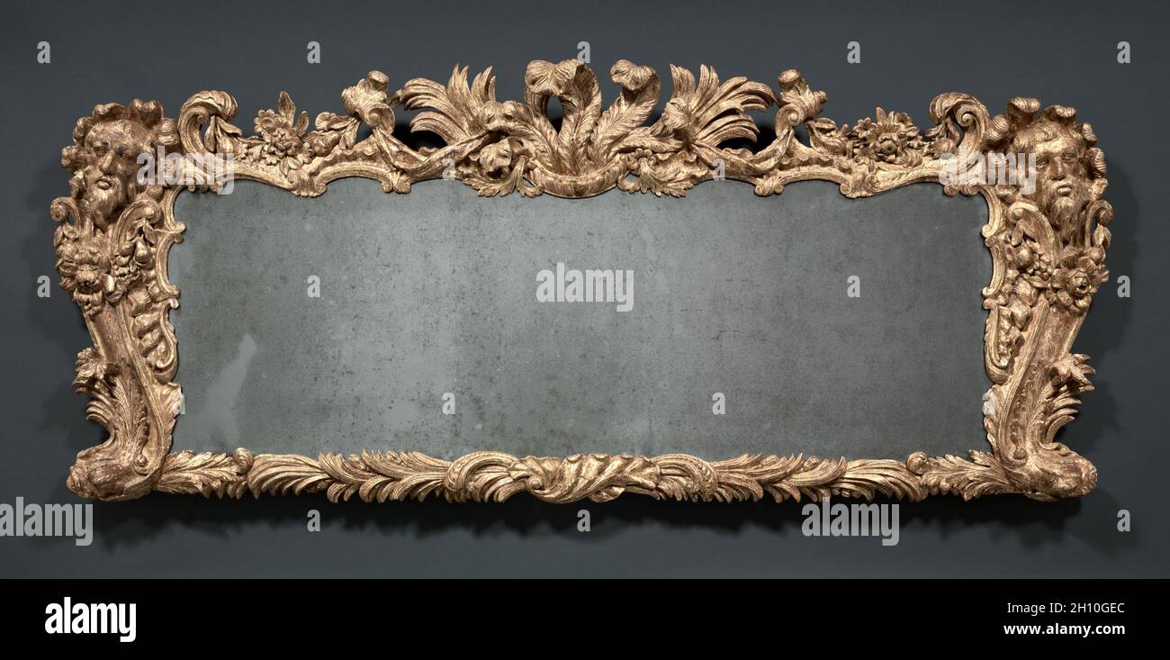 Overmantel Mirror, c. 1740. James Pascall (British, c. 1697-1746). Carved giltwood and glass; overall: 78 x 186 cm (30 11/16 x 73 1/4 in.). Stock Photo