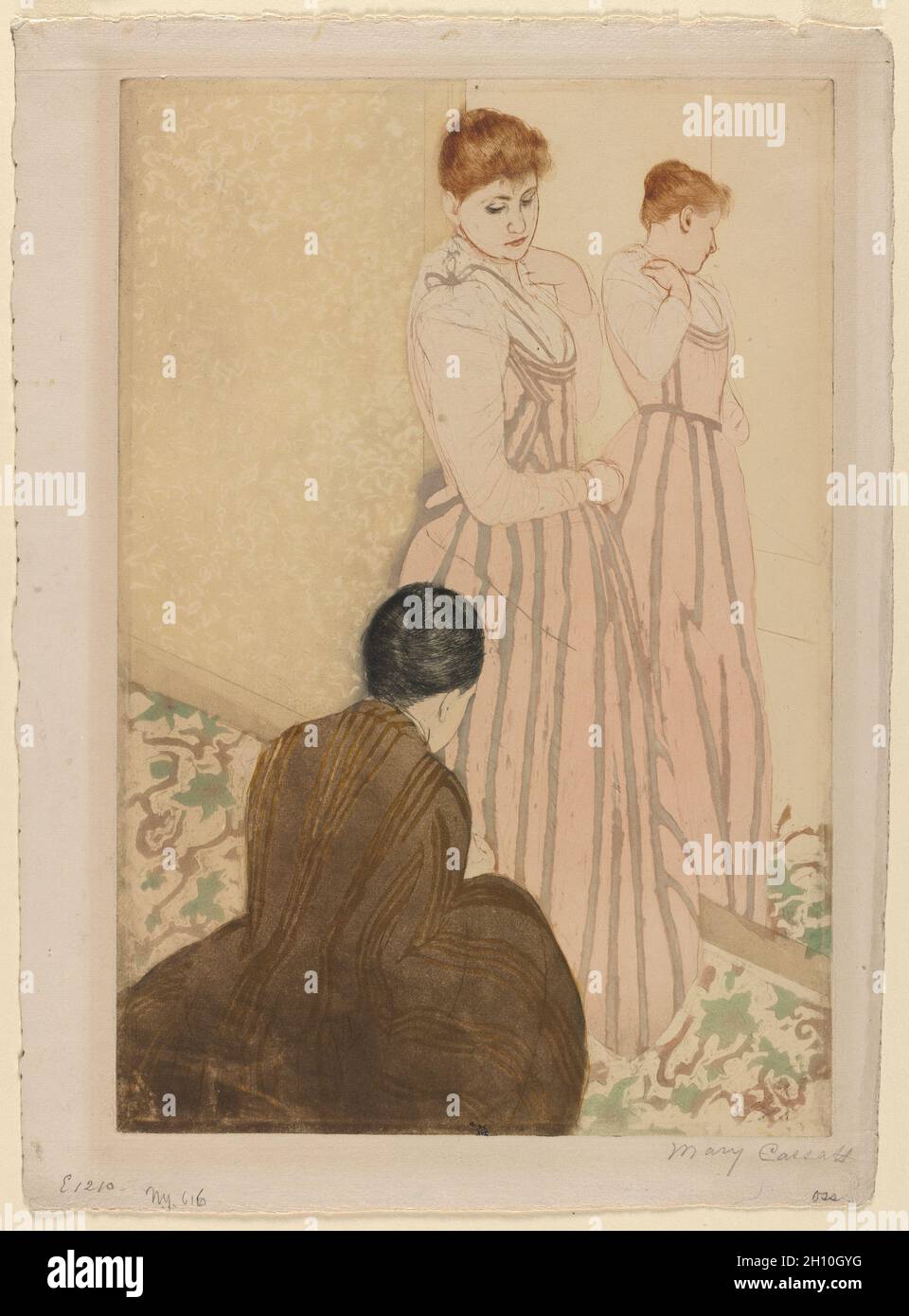 The Fitting, 1890–91. Mary Cassatt (American, 1844-1926). Color drypoint and aquatint; platemark: 37.6 x 25.5 cm (14 13/16 x 10 1/16 in.); sheet: 42.7 x 31.4 cm (16 13/16 x 12 3/8 in.). Stock Photo