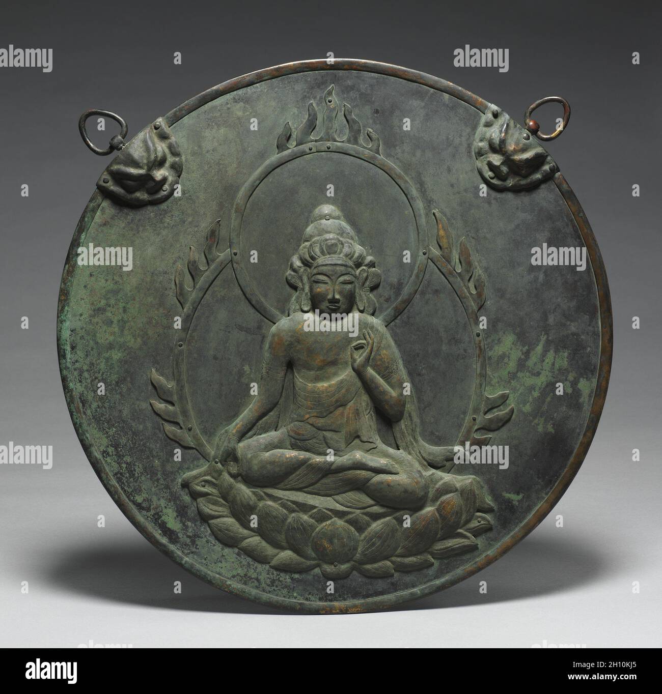 Votive Hanging with Image of Kannon (Kannon Kakebotoke), mid- to late 1300s. Japan, Nanbokuchō period (1336-92). Bronze with repoussé and etching; diameter: 52.5 cm (20 11/16 in.). Stock Photo