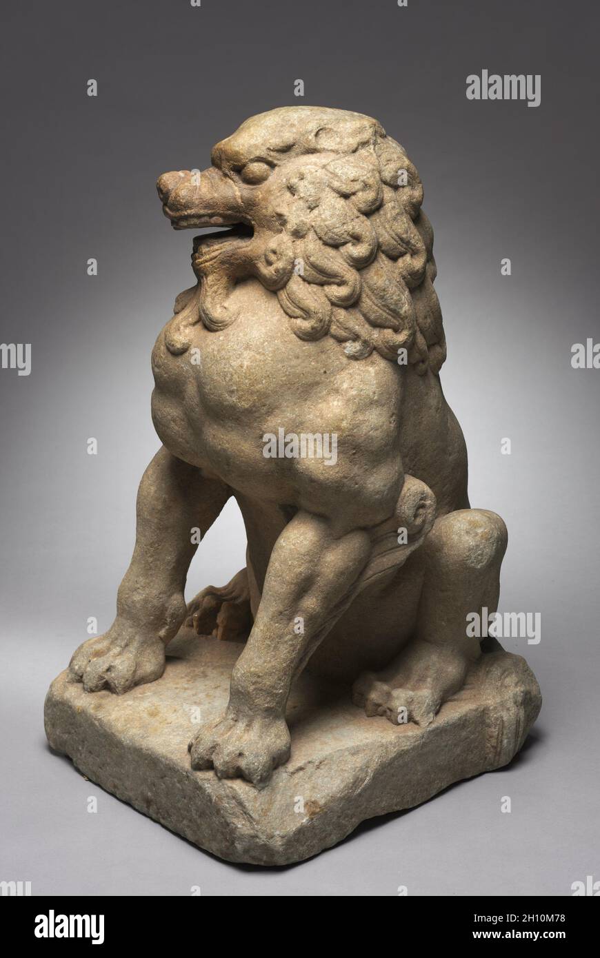 Guardian Lion, c. 600. China, Tang dynasty (618-907). White marble; overall: 78.8 cm (31 in.); base: 49.6 x 41.8 cm (19 1/2 x 16 7/16 in.). Stock Photo