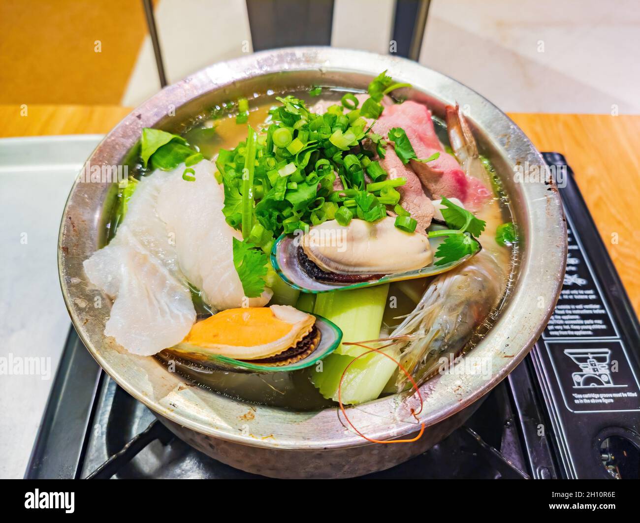 Seafood hot pot hires stock photography and images Alamy