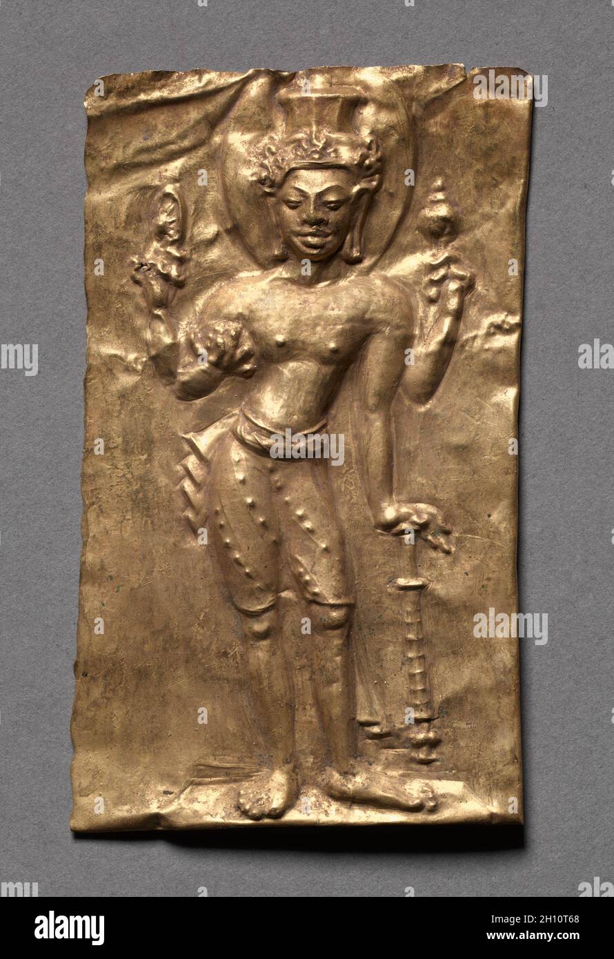 Plaque with Vishnu, c. 600s. Thailand, Sri Deb Style, Mon-Dvaravati period, c. 7th-8th Century. Gold repoussé; overall: 7.6 x 4.5 cm (3 x 1 3/4 in.). Stock Photo