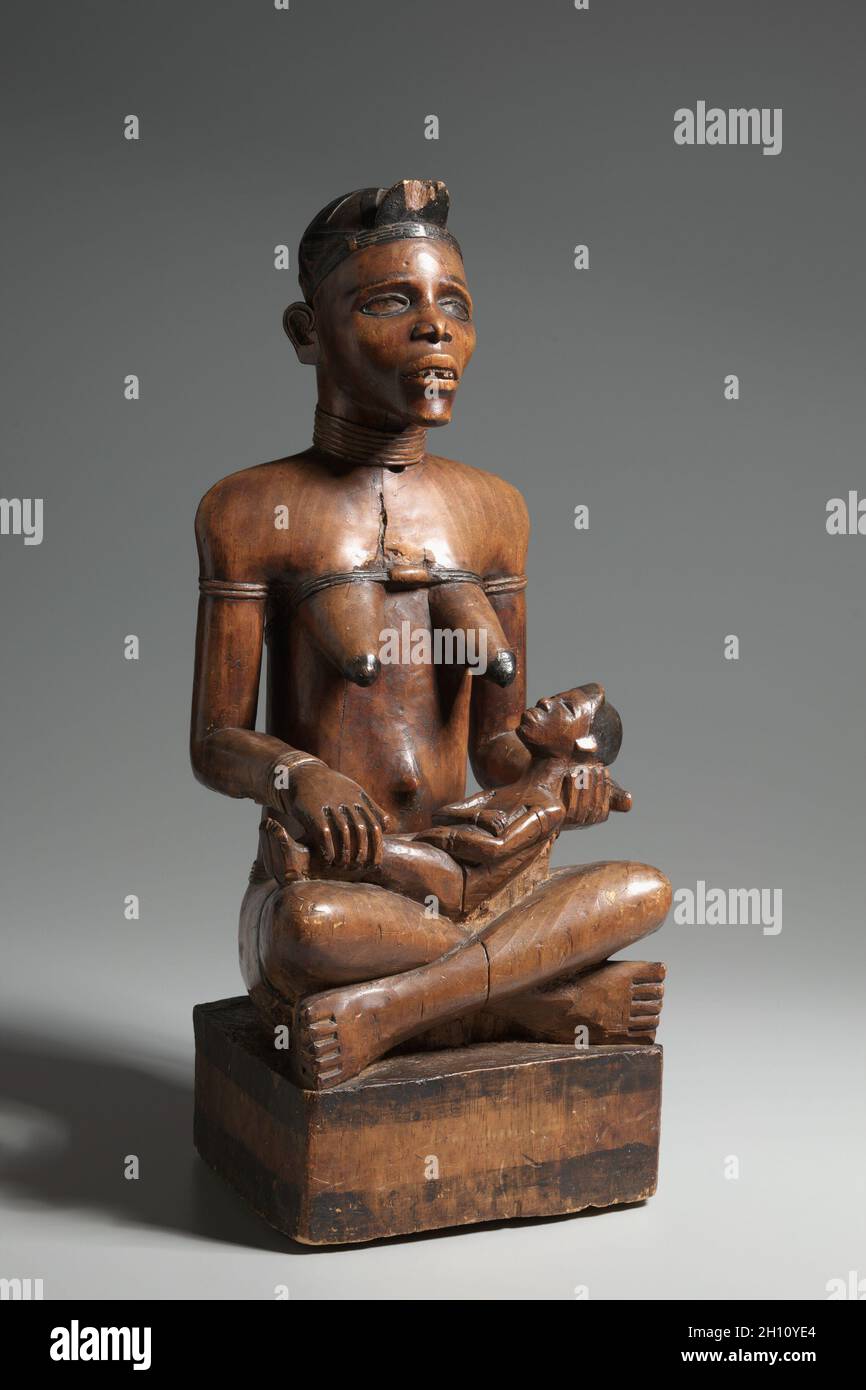 Mother and Child Figure, late 1800s-early 1900s. Central Africa, Democratic Republic of Congo, Yombe, late 19th-early 20th century. Wood and paint; overall: 64.7 cm (25 1/2 in.). Stock Photo