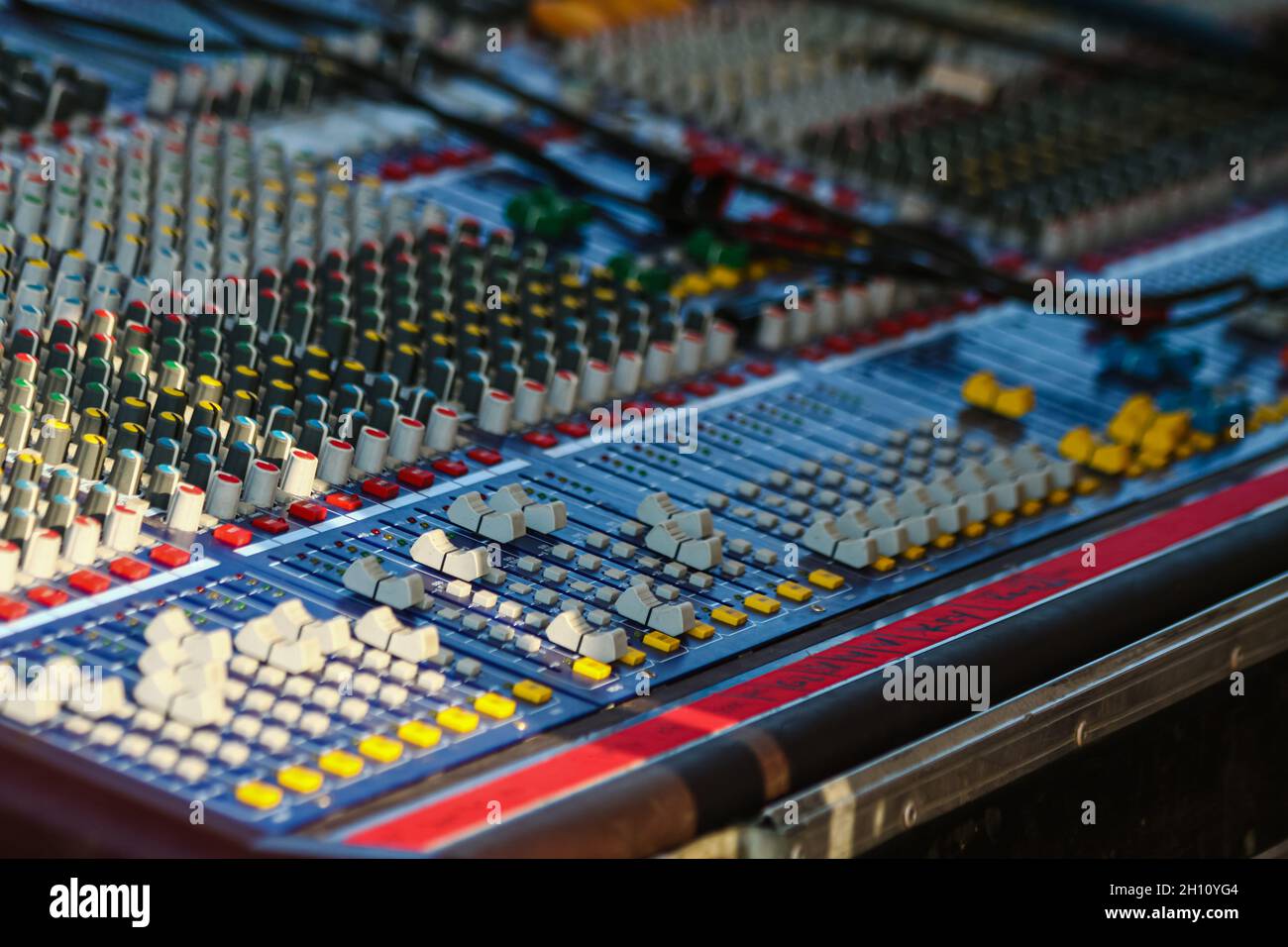 Recording console. A sound engineer's mixing desk at a music festival ...