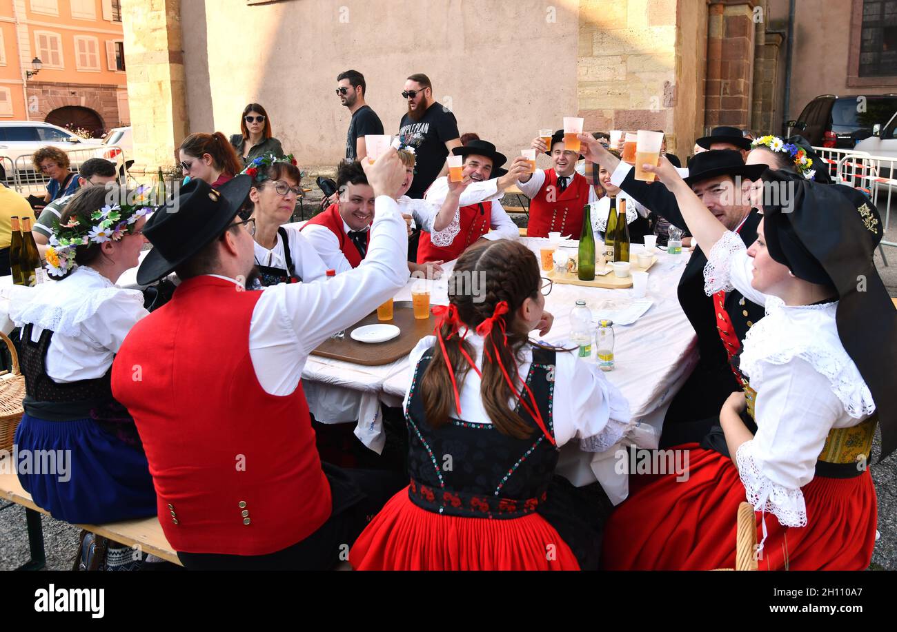 Traditional Alsace folk dancing in the village of Turkheim during the Alsace grape harvest 2021 Stock Photo