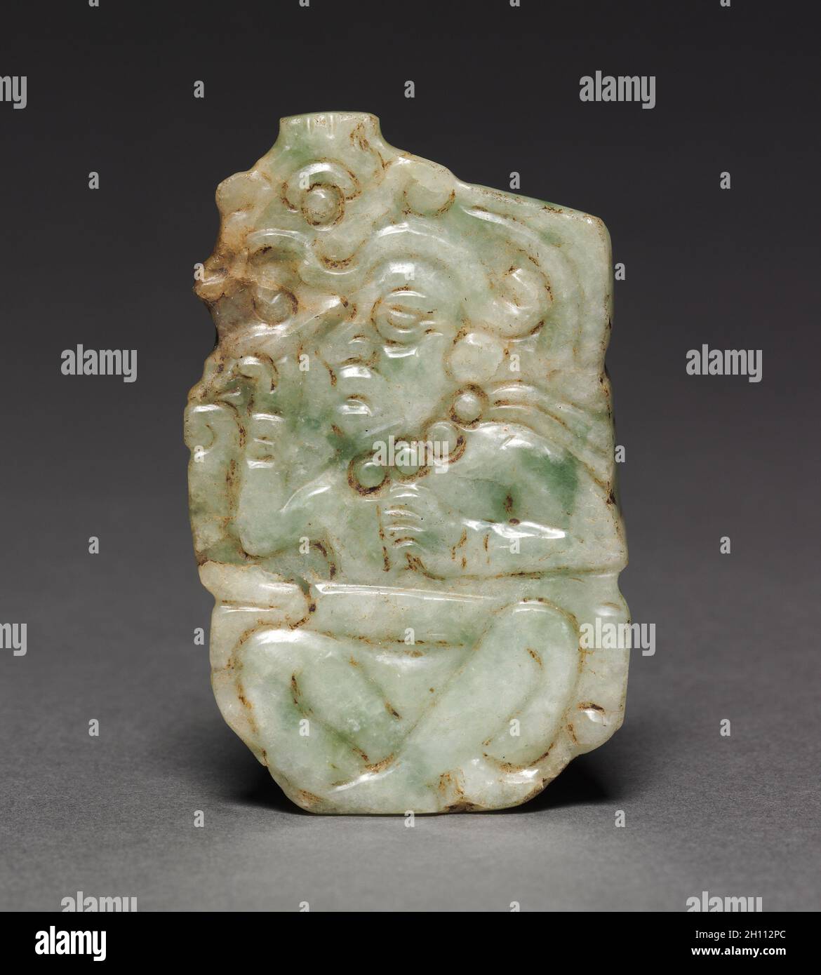 Pendant with Scribe Figure, c. 700-1000. Mexico, Mixtec?, 8th-11th Century. Jade; overall: 7.3 x 4.5 x 0.5 cm (2 7/8 x 1 3/4 x 3/16 in.). Stock Photo