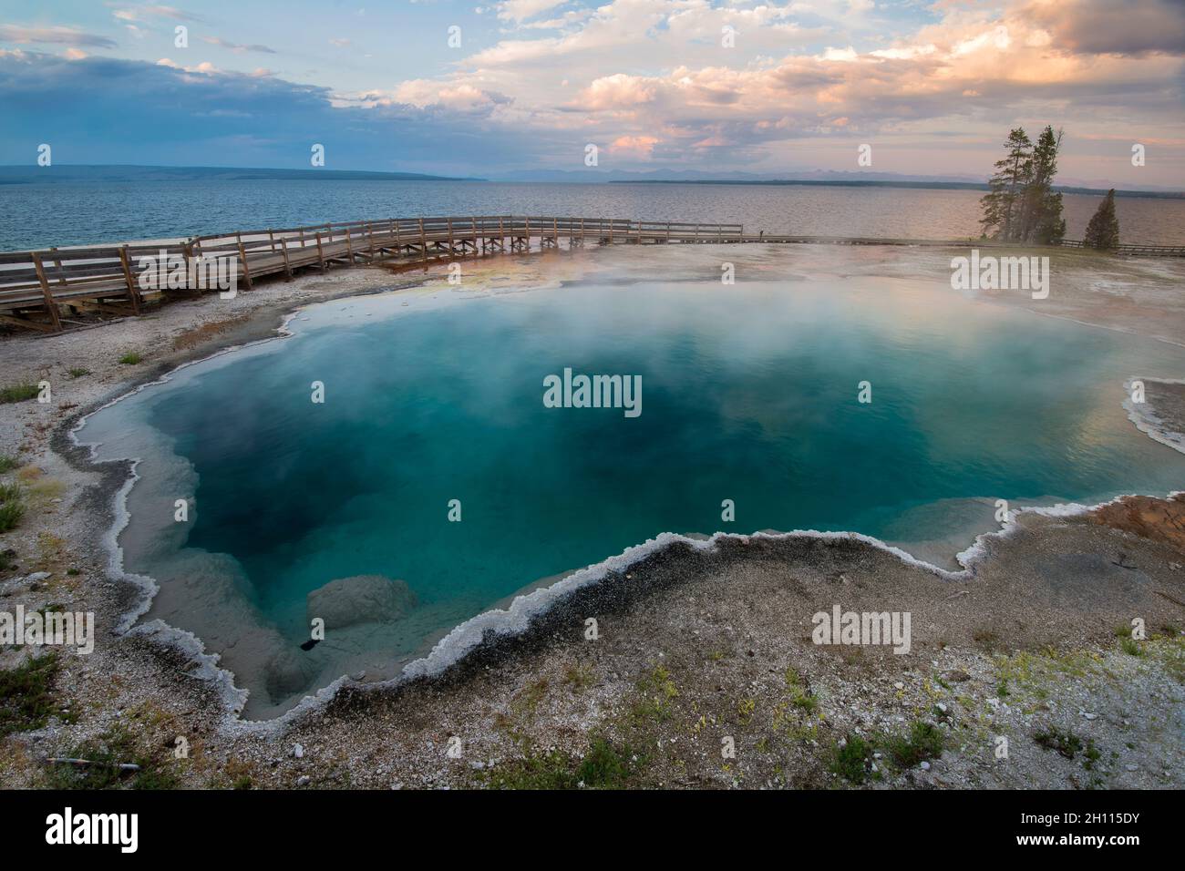 Black Pool, Sunset over West Thumb Geyser Basin, Yellowstone National Park, Wyoming Stock Photo