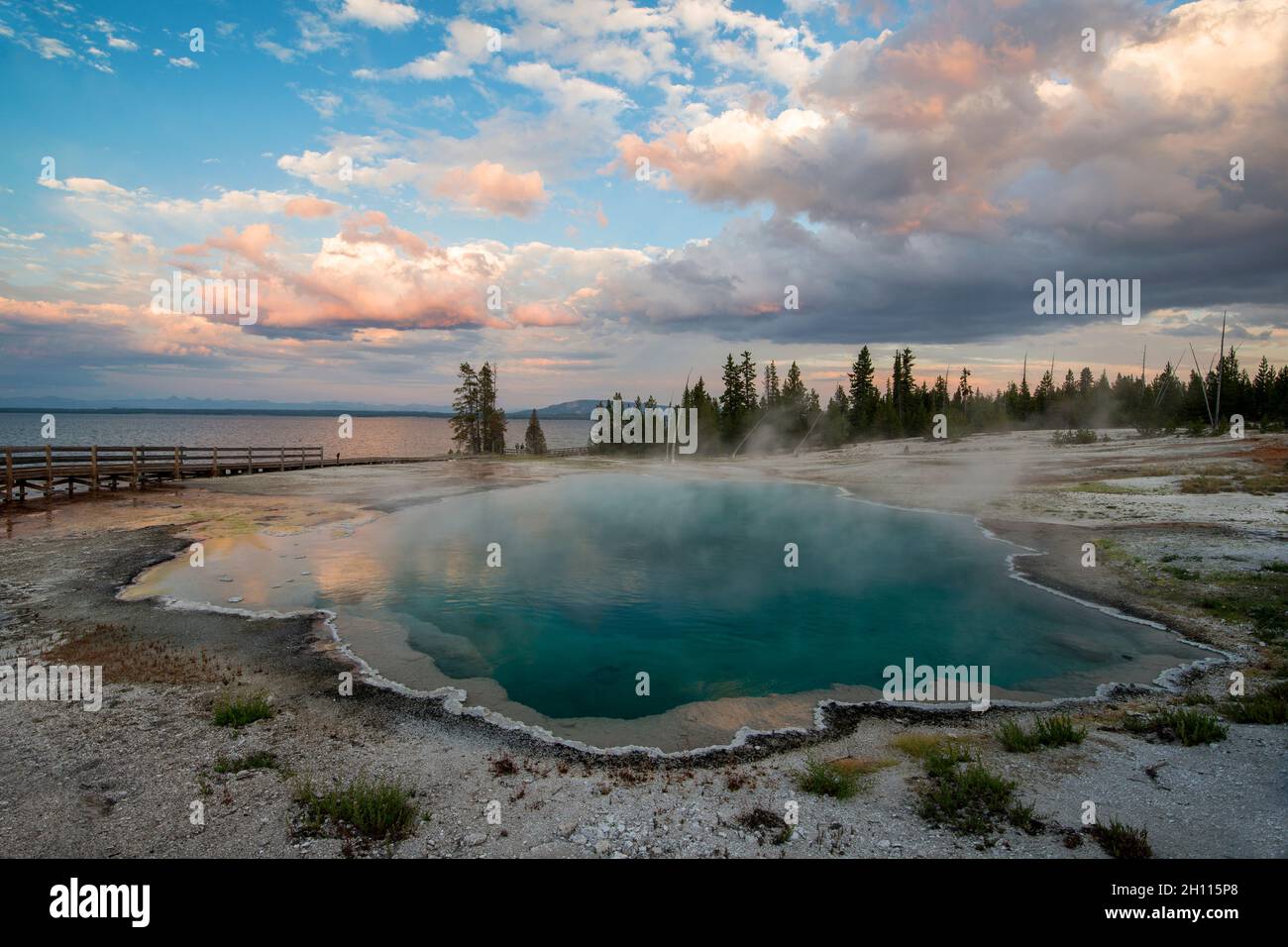 Black Pool, Sunset over West Thumb Geyser Basin, Yellowstone National Park, Wyoming Stock Photo