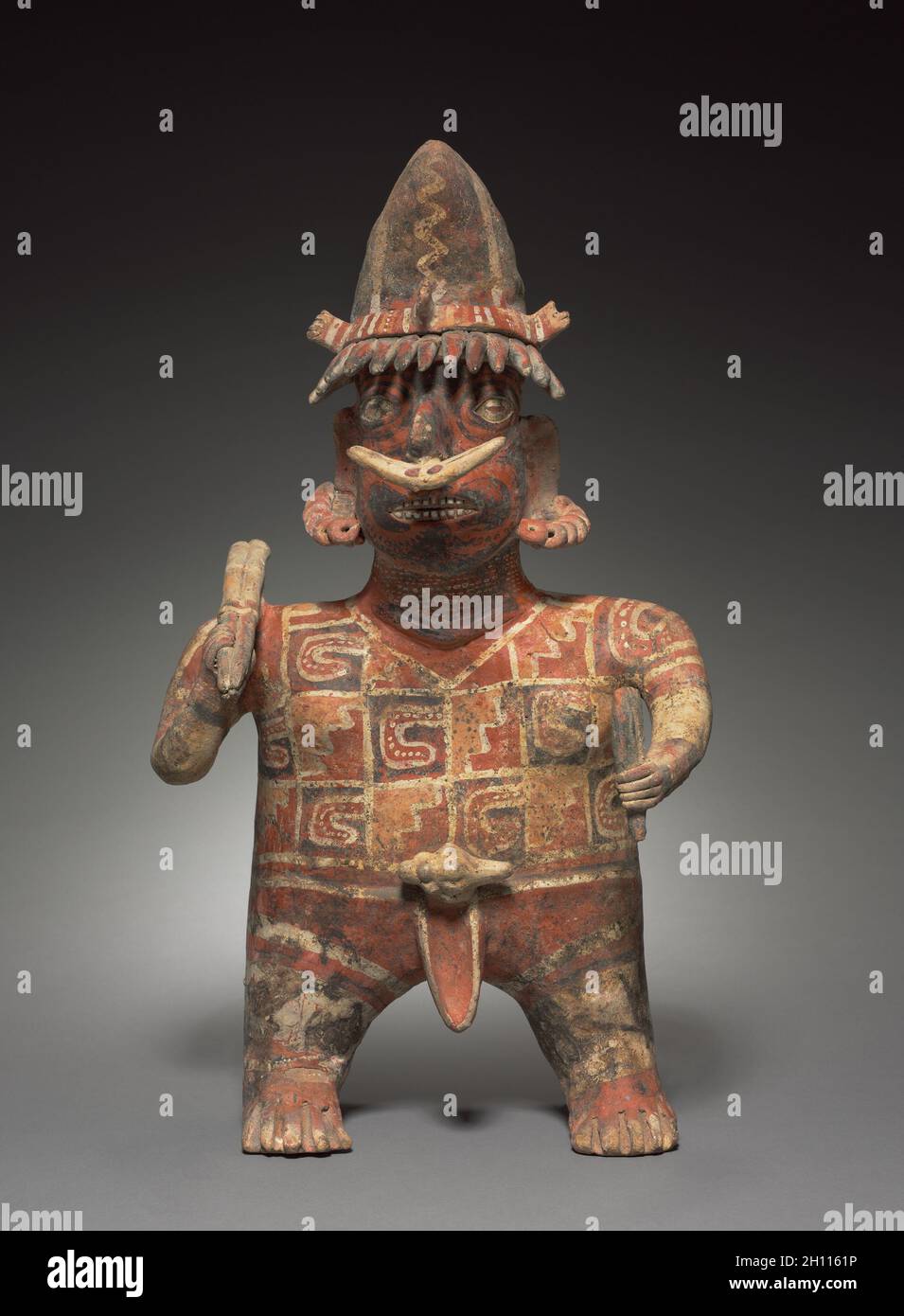 Standing Male Figure, c. 100 BC-AD 300. Mexico, Nayarit, Ixtlan del Rio Style. Earthenware with colored slips; overall: 52 x 32.5 x 19.5 cm (20 1/2 x 12 13/16 x 7 11/16 in.). Stock Photo