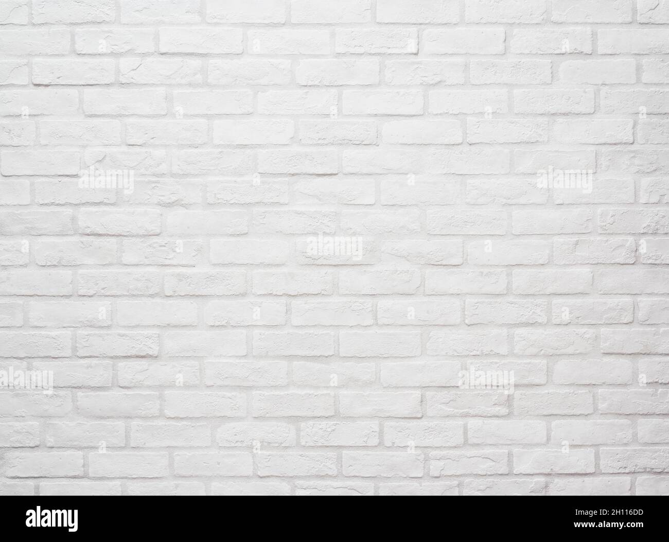 Flat stacked white brick wall. Background and Texture Stock Photo