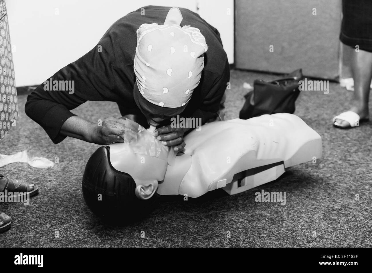 JOHANNESBURG, SOUTH AFRICA - Aug 12, 2021: A First Aid CPR training with plastic dummy Stock Photo