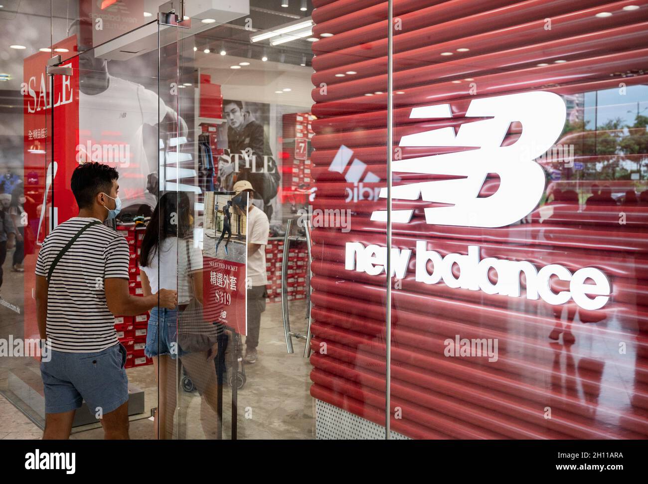 American footwear brand New Balance store and logo seen in Hong Kong Stock  Photo - Alamy