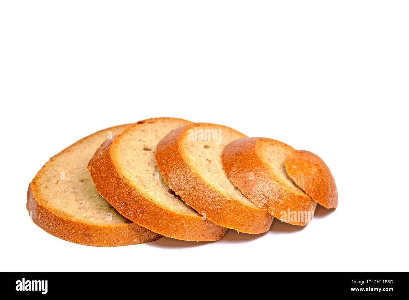 Sliced bread against white background Stock Photo Alamy