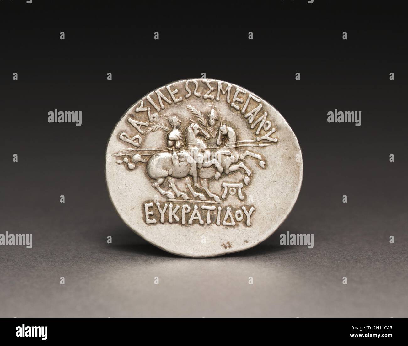 Coin of Eukratides I, 170-145 BC. Afghanistan, Bactria, Bactrian period (3rd-2nd Century BC), Eukratides I. Silver; diameter: 3.4 cm (1 5/16 in.). Stock Photo