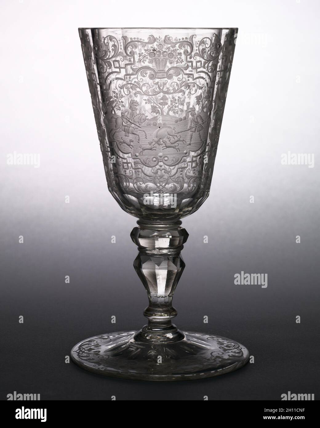 Cup, c. 1720. Bohemia, 18th century. Glass; diameter: 11.5 cm (4 1/2 in.); overall: 21 x 9.7 cm (8 1/4 x 3 13/16 in.). Stock Photo