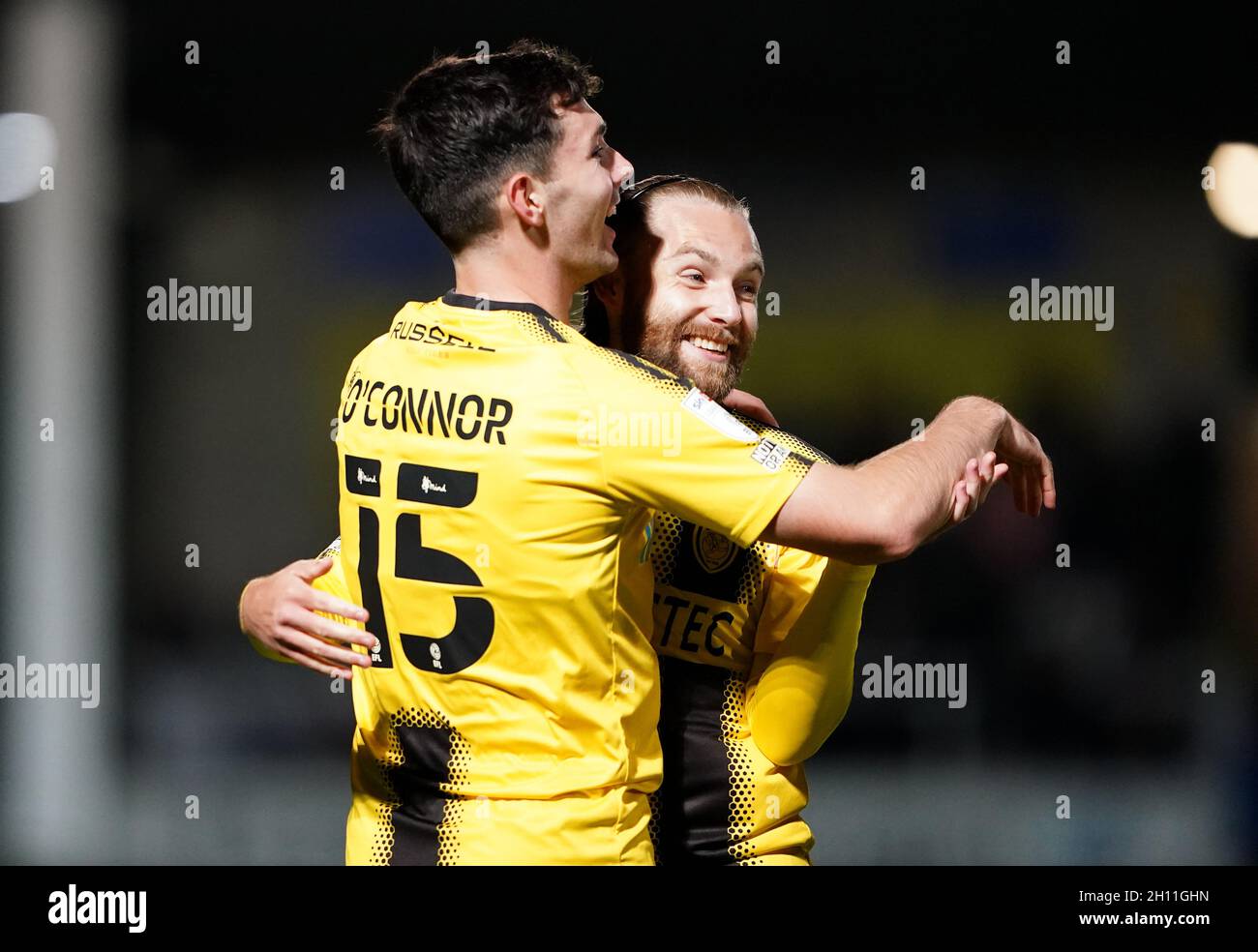 Burton Albion's Thomas O'Connor (left) celebrates with Harry Chapman after scoring their side's first goal of the game during the Sky Bet League One match at the Pirelli Stadium, Burton upon Trent. Picture date: Friday October 15, 2021. Stock Photo
