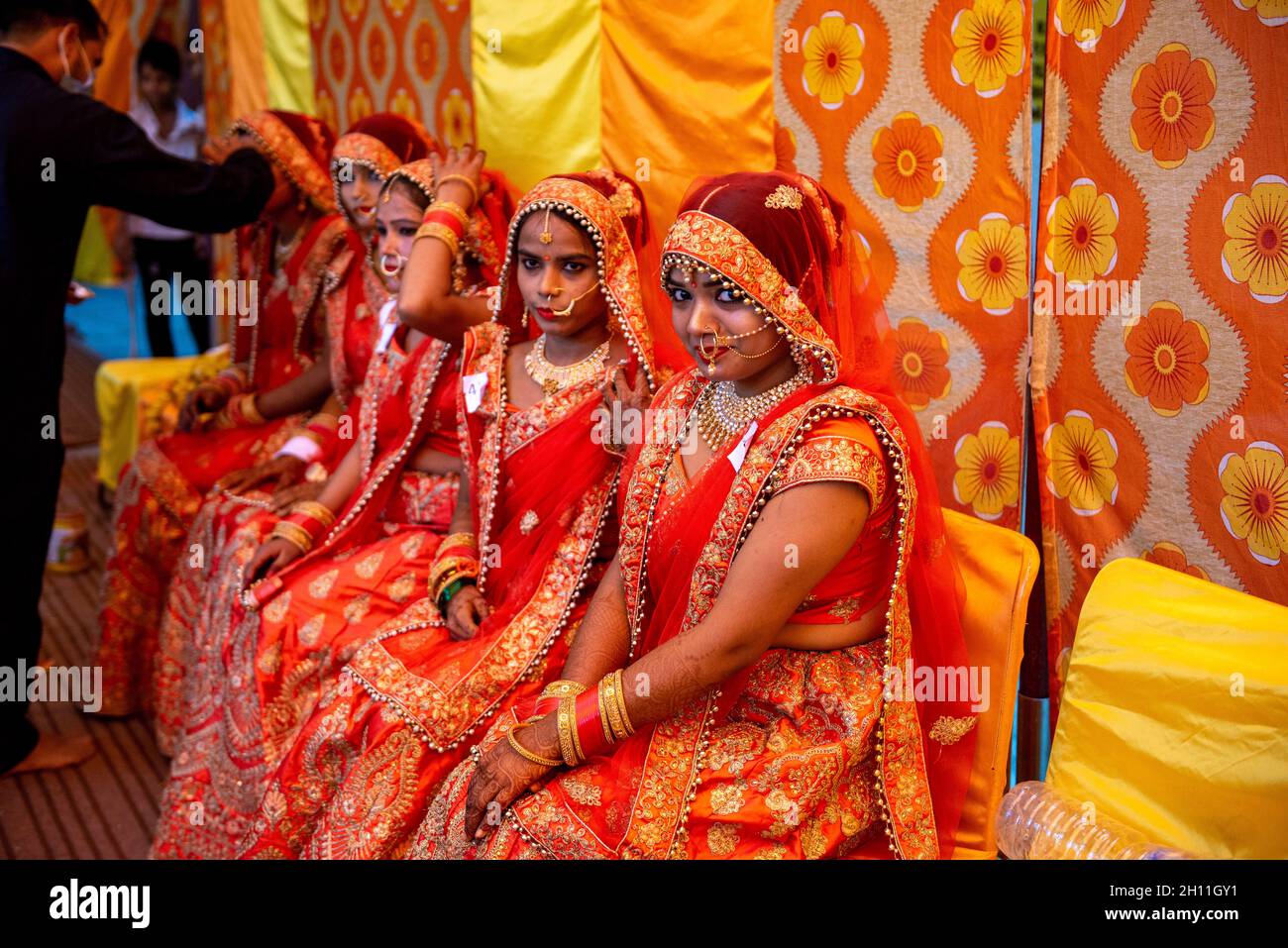New Delhi, India. 15th Oct, 2021. Brides with coy smile in traditional