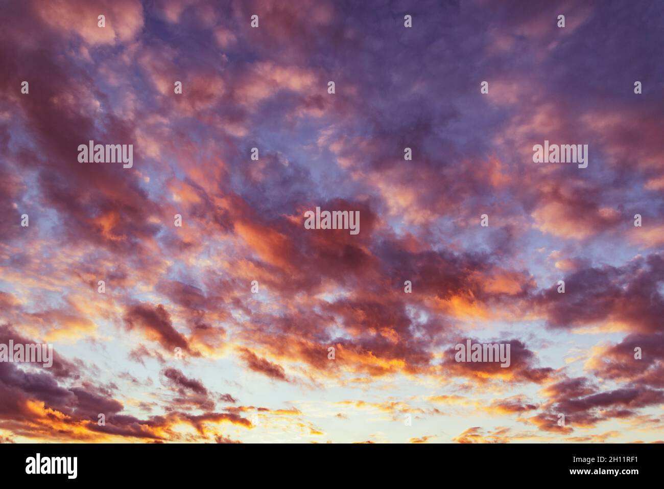 Amazing cloudscape on the sky at sunset time after rain Stock Photo - Alamy