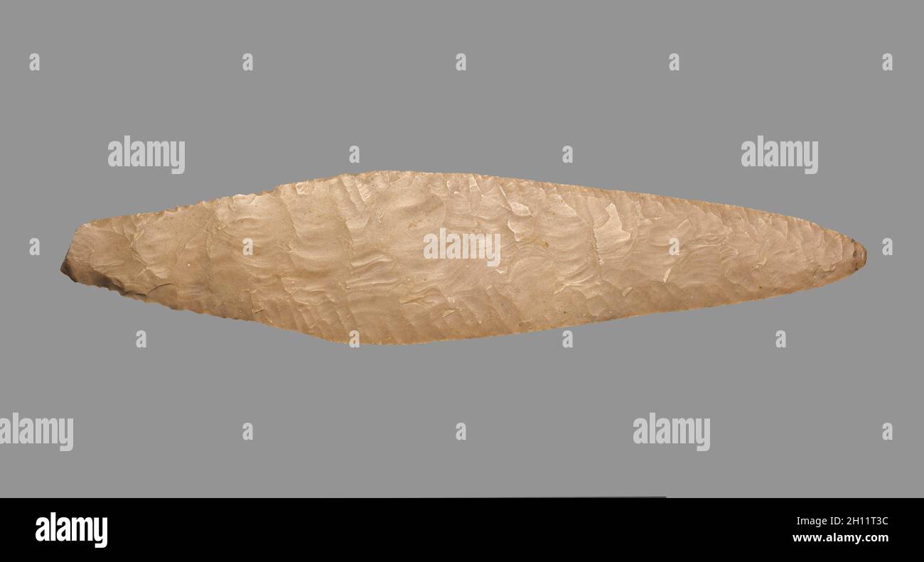 Rhomboidal Knife, 4500-3500 BC. Egypt, Predynastic Period, Naqada Ia-b period. Light brown flint; overall: 4 cm (1 9/16 in.). Stock Photo