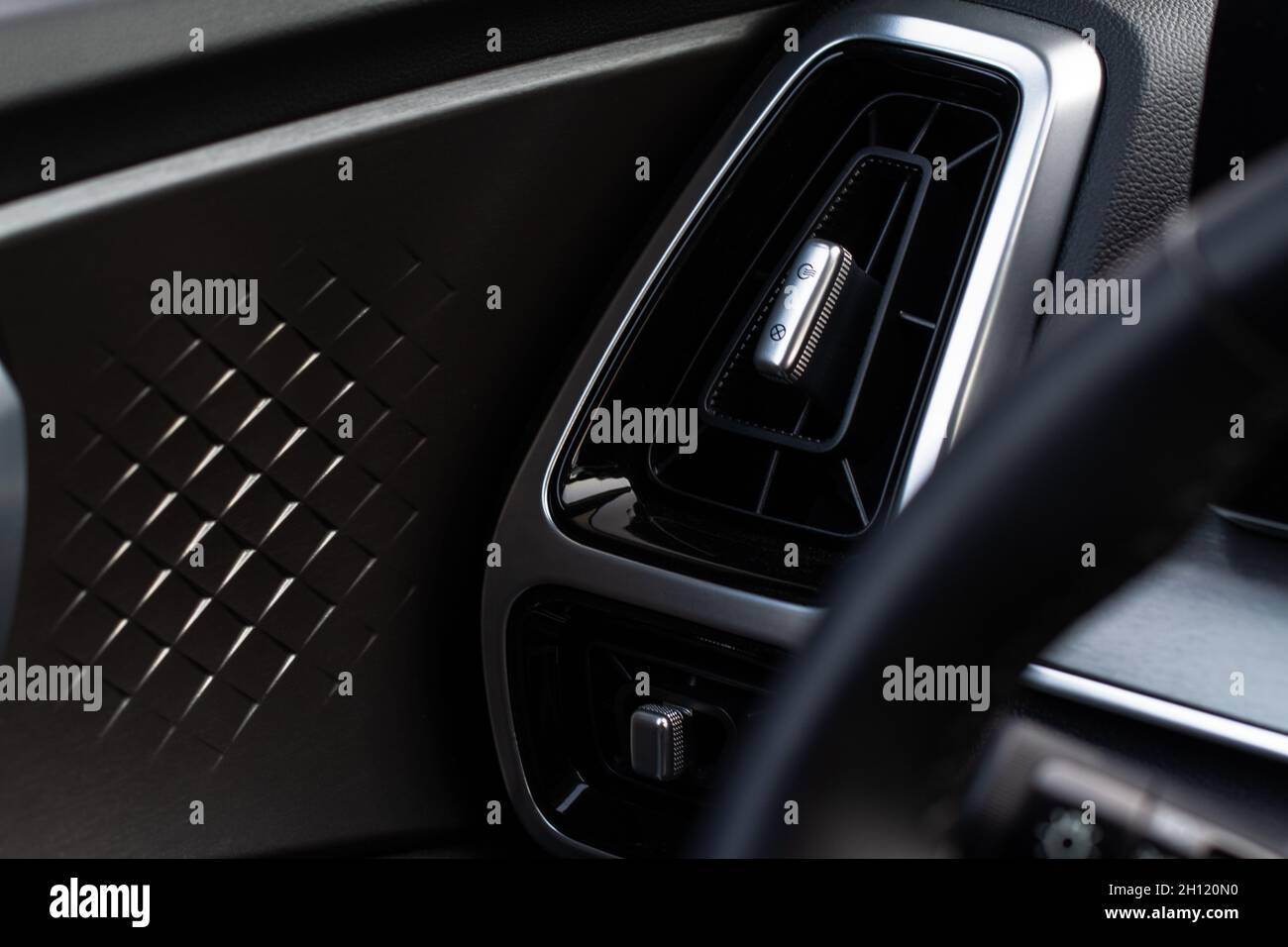 Car air conditioning close up view. The air conditioner flow inside the