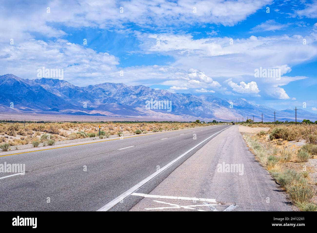 Scenic landscape of the Eastern Sierra mountains along US Route 395. About 30 minutes outside of Bishop, CA, USA. Stock Photo