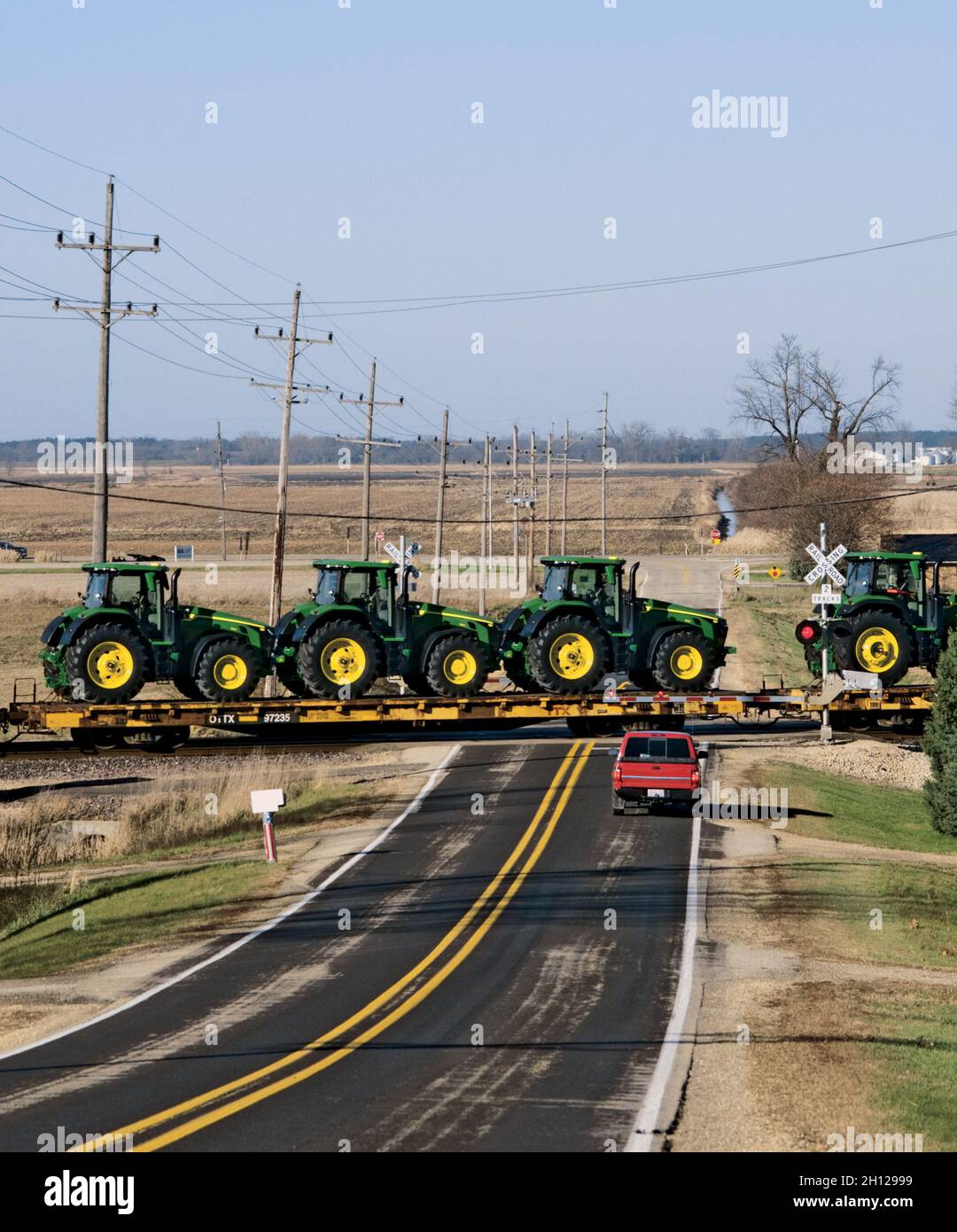 Railroad Flatcars with John Deere Tractors to be Exported Overseas Stock Photo