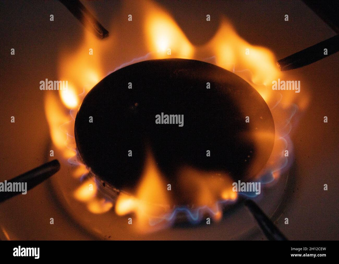 Gas flames, gas burner in a kitchen, gas price increase Stock Photo Alamy