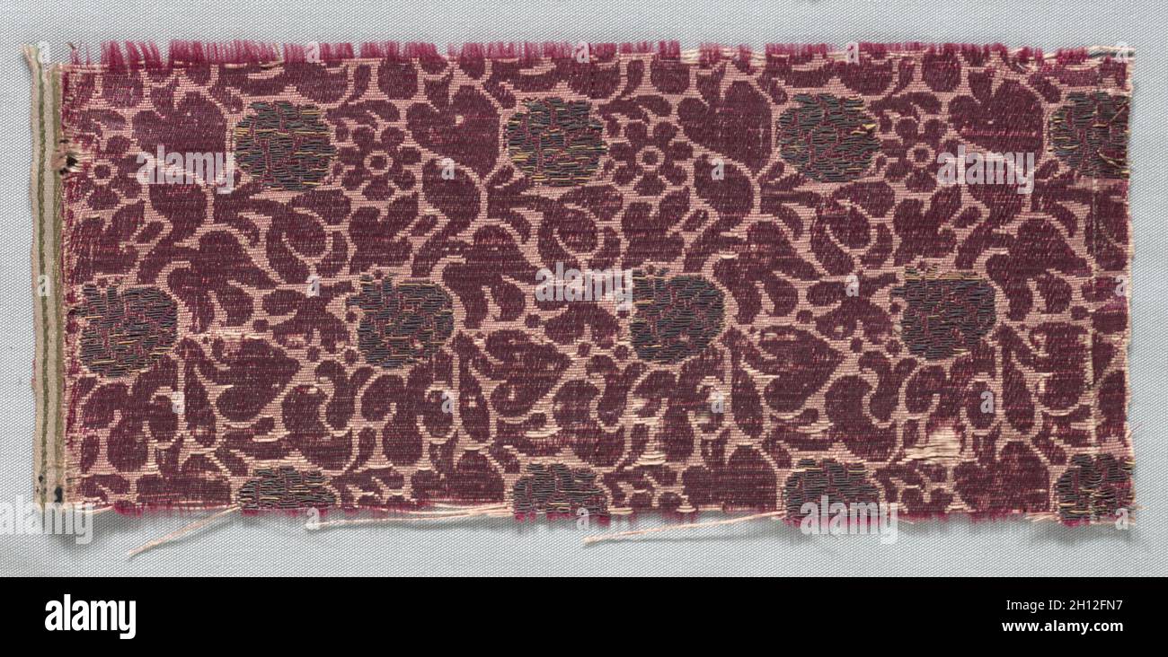 Brocaded Textile Fragment, late 1500s - early 1600s. Italy, late 16th - early 17th century. Brocade; silk and metal; overall: 11.4 x 25.4 cm (4 1/2 x 10 in.). Stock Photo