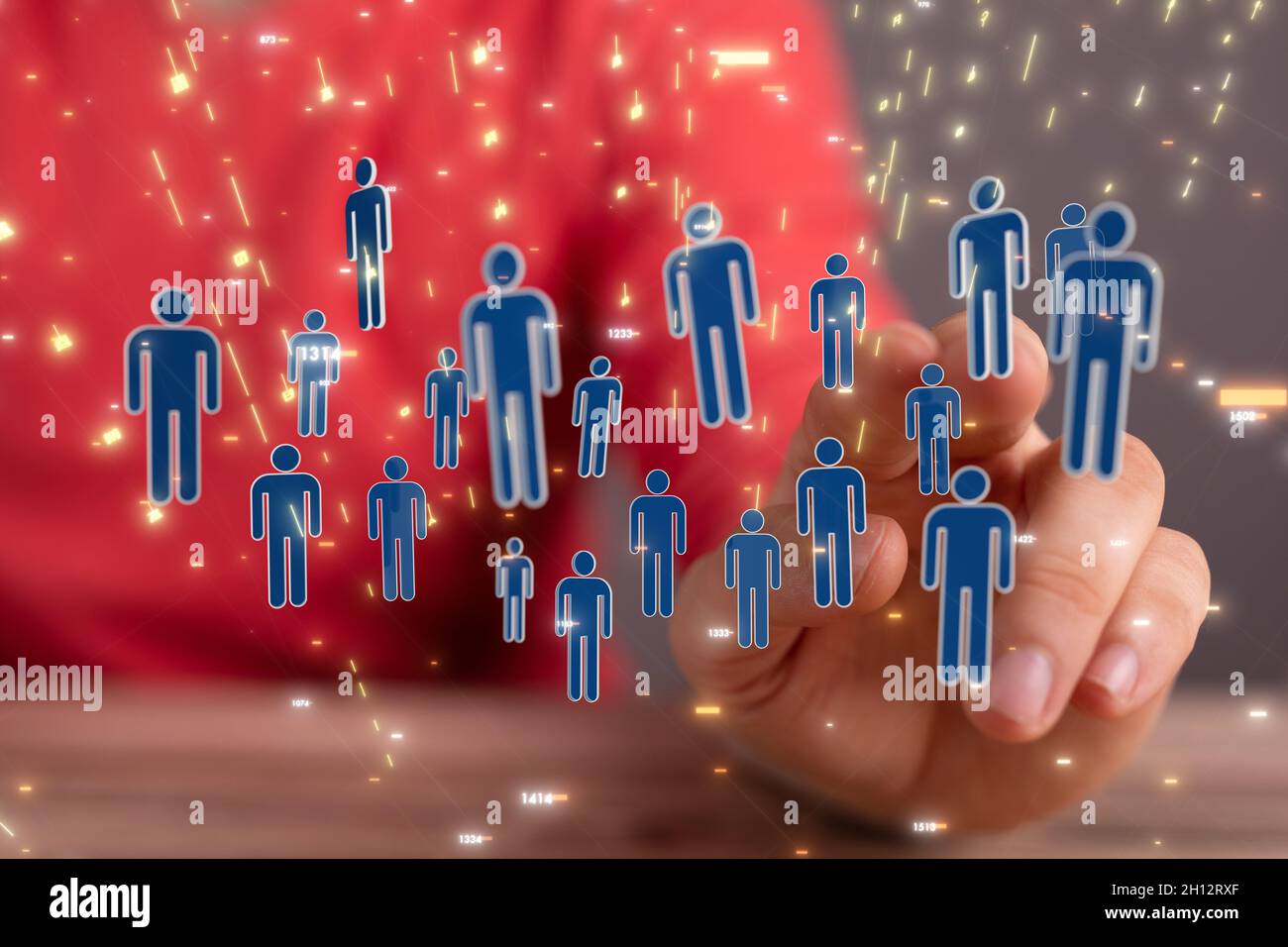 Person tapping floating 3D rendered human icons - digital work ...