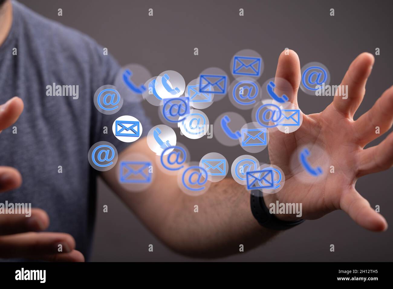 3D rendering of mail and phone icons hovering between man's hands Stock ...