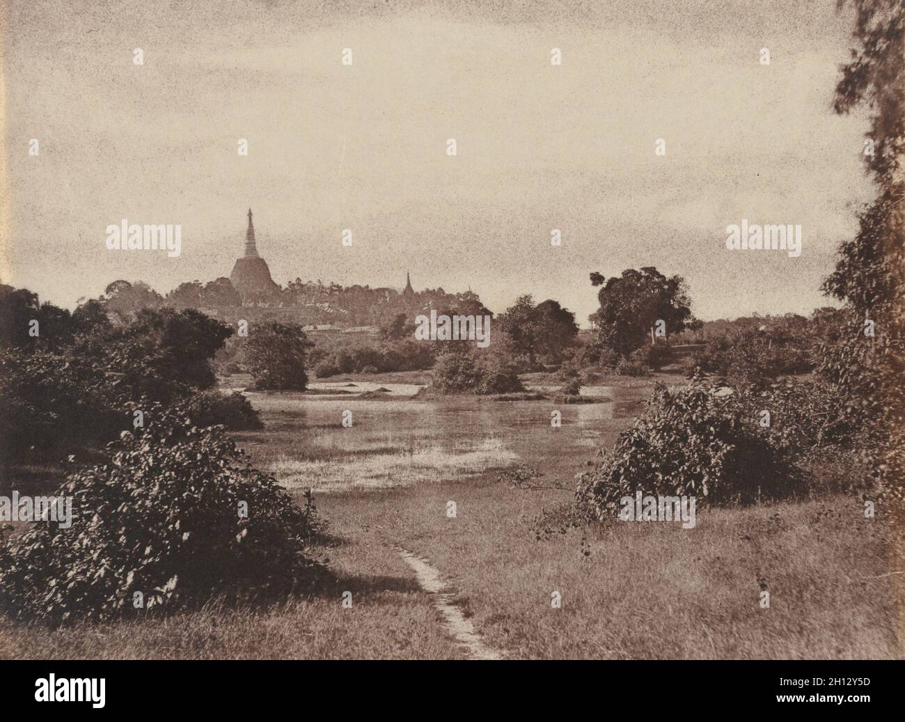 Rangoon. View Near the Lake, 1855. Captain Linnaeus Tripe (British, 1822-1902). Albumenized salt print from a paper negative; image: 25.1 x 34.3 cm (9 7/8 x 13 1/2 in.); paper: 25.1 x 34.3 cm (9 7/8 x 13 1/2 in.); matted: 45.7 x 55.9 cm (18 x 22 in.). Stock Photo