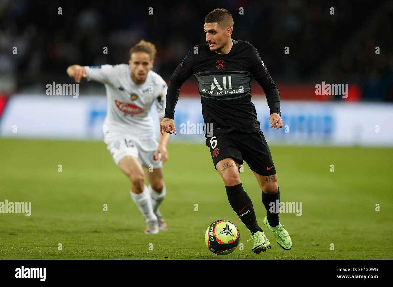 Paris, France. 16th Oct, 2021. Paris Saint Germain's Marco Verratti (R) competes during a French Ligue 1 football match between Paris Saint Germain (PSG) and Angers SCO in Paris, France, Oct. 15, 2021. Credit: Xinhua/Alamy Live News Stock Photo