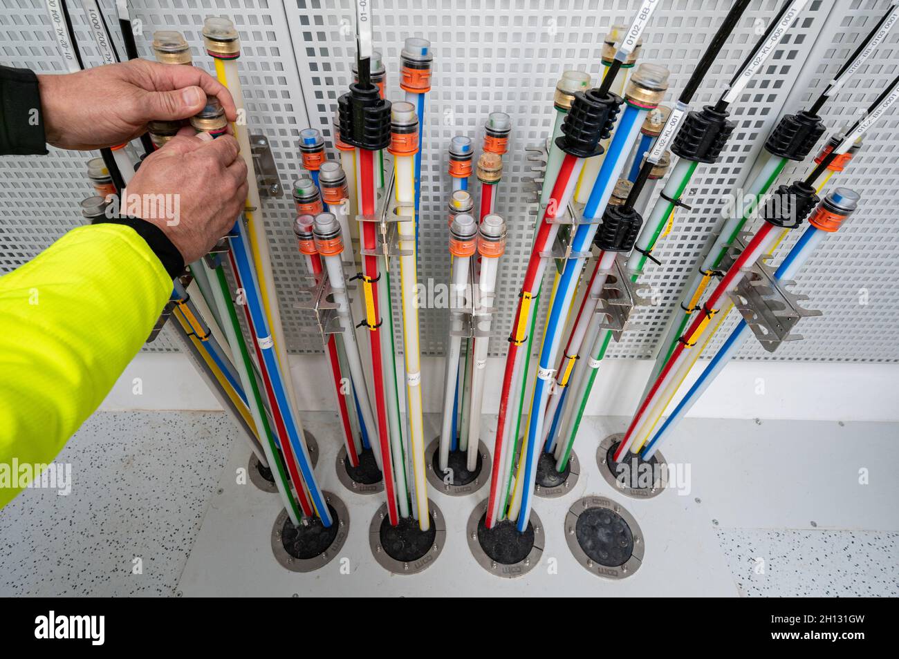 Falkenstein, Germany. 12th Oct, 2021. Cables in a PoP distributor of
