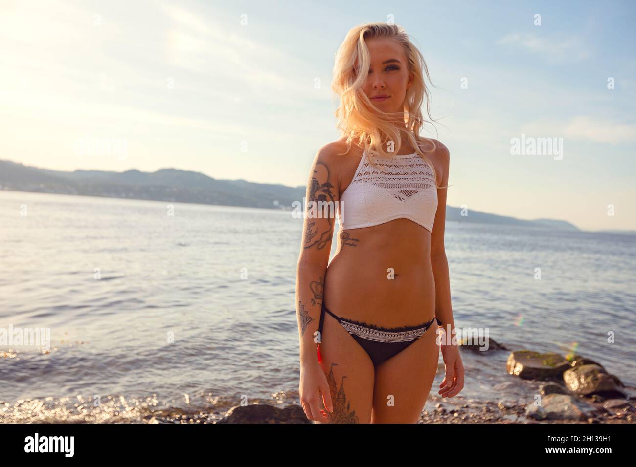 Portrait Of Scandinavian Beautiful Young Woman In Bikini At Beach Stock Photo