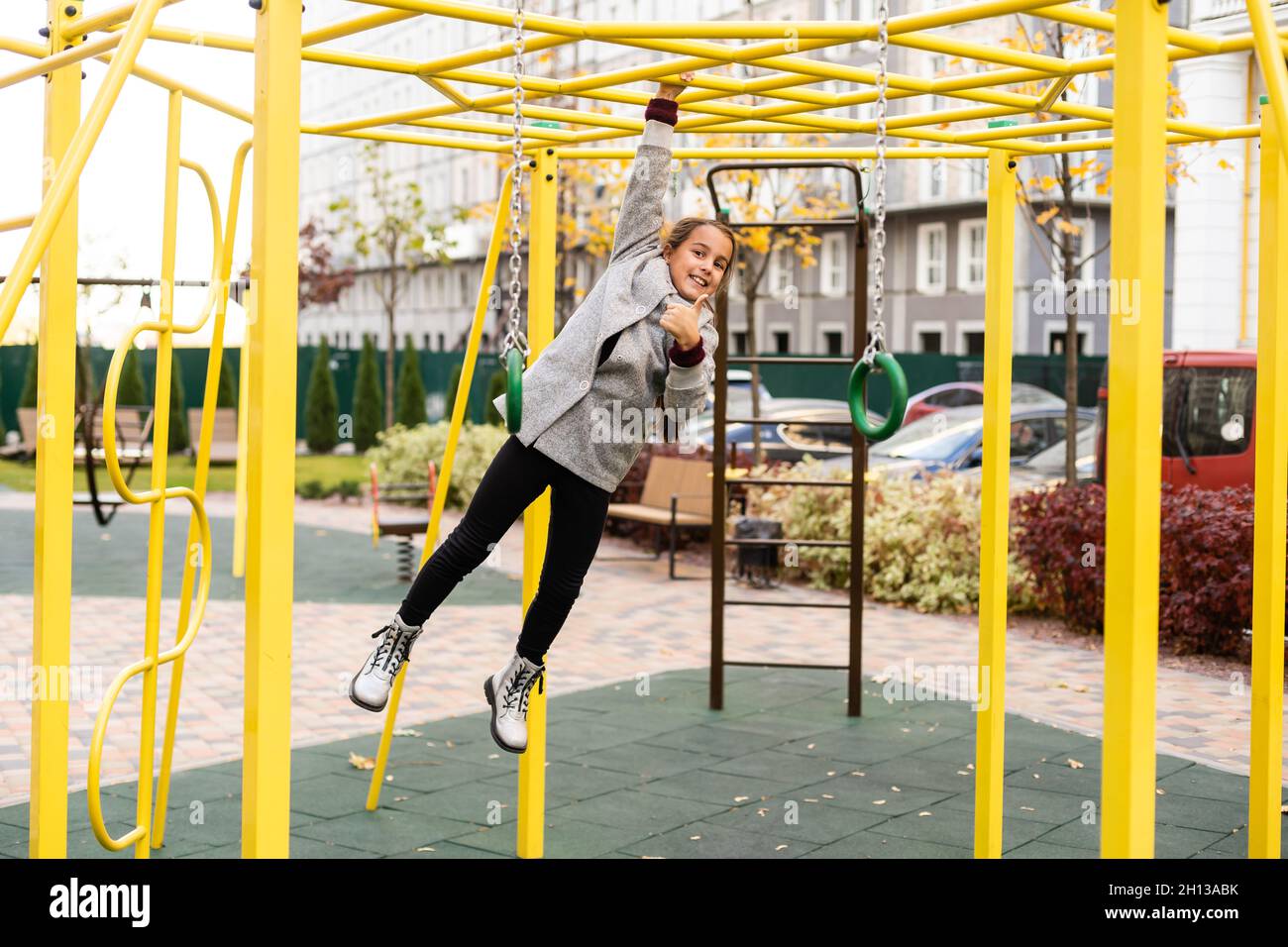 portrait of a little schoolgirl girl at the playground Stock Photo - Alamy